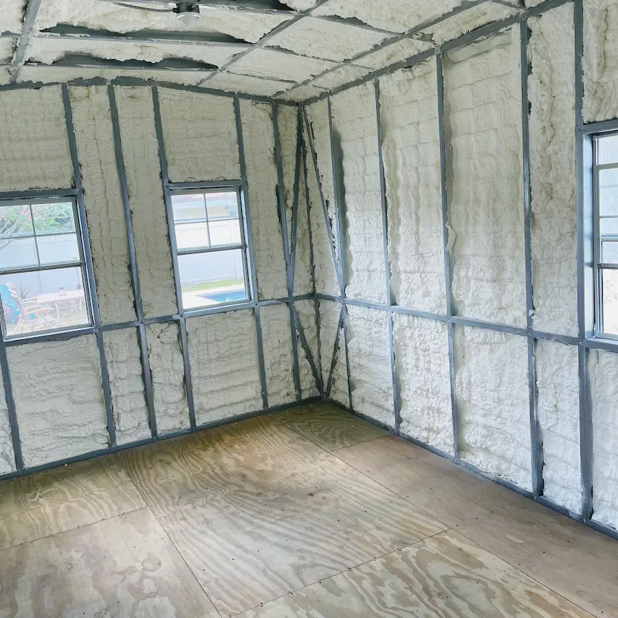 Closed-cell spray foam insulation applied to wall cavities in a residential project in Johnstown